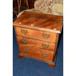 A SMALL EARLY 20TH CENTURY GEORGIAN STYLE WALNUT CHEST OF THREE GRADUATING DRAWERS, on bracket feet,