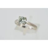 AN 18CT GOLD SINGLE STONE SYNTHETIC MOISSANITE RING, the cushion cut moissanite within a four claw