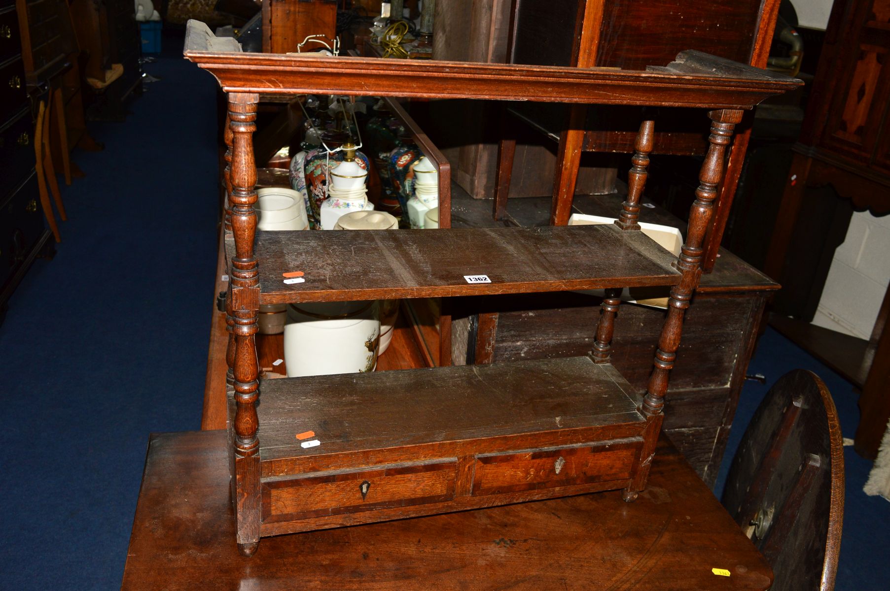 A GEORGIAN OAK AND BANDED HANGING WALL SHELF, with two drawers, width 72cm x depth 24cm x height