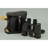 A PAIR OF WWII ERA GERMAN BINOCULARS, in black leather case, the case is embossed 1942, the