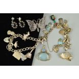 SIX ITEMS OF JEWELLERY, to include two charm bracelets suspending twenty six charms including a