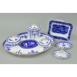 A WEDGWOOD BLUE AND WHITE PART DRESSING TABLE SET, comprising a tray, two covered trinkets, one lid,