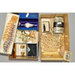 TWO SMALL BOXES OF COSTUME JEWELLERY, to include a cased Tissot watch of textured design,