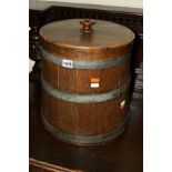 A GEORGIAN OAK COPPERED BUCKET, with a later lid and tin insert