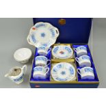 A BOXED COALPORT 'REVELRY' COFFEE SET, consisting of six cups and seven saucers, together with a