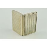 A RECTANGULAR TRINKET BOX, with banded engine turned decoration, gilt interior, inner reflective