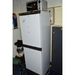 A TALL HOTPOINT FRIDGE/FREEZER, height 179cm, together with a microwave (2)
