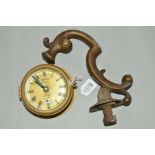 A SMALL BRASS SMITHS SHIPS CLOCK, approximate diameter 11.5cm, together with a brass door knocker