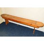 AN EARLY 20TH CENTURY ELM AND PINE BENCH, width 185cm