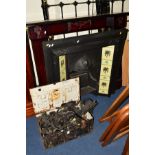 A 20TH CENTURY CAST IRON FIRE PLACE, inset with floral decorated tiles (possibly Minton), a mahogany