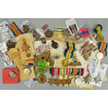 A BOX CONTAINING A COLLECTION OF BRITISH MILITARY MEDALS, CAP BADGES, PINS, RIBBONS, etc, as