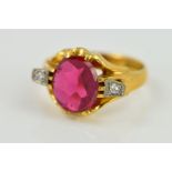A LATE 20TH CENTURY SYNTHETIC RUBY AND DIAMOND GENT'S RING, estimated total diamond weight 0.06ct,