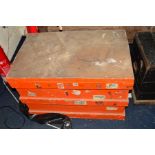 A LARGE VINTAGE ORANGE PAINTED WOODEN TOOL CHEST and a set of step ladders (2)