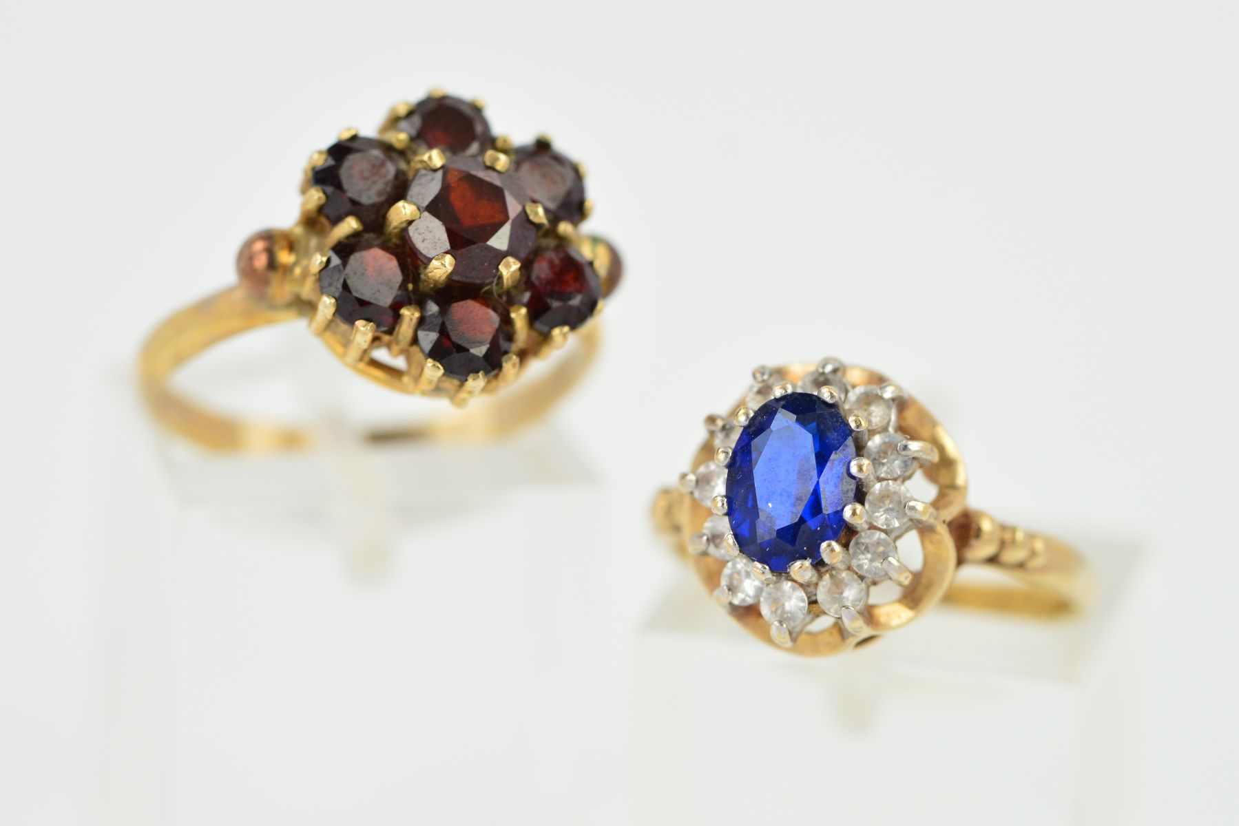 TWO RINGS, to include 9ct gold garnet round cluster ring, ring size N, hallmarked 9ct gold, a 9ct