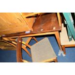 A 1950'S/60'S TEAK AND OAK EXTENDING DINING TABLE, together with four bar back chairs, possible