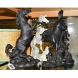 THREE FRANKLIN MINT HORSES, to include a pair of 'Battling Stallions' and a 'Racing Stallion' all by