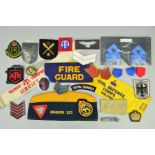 A BOX CONTAINING VARIOUS UNIT/RANK PATCHES AND OTHER ITEMS, armbands, etc, all Military from WWII