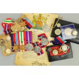 A BOX CONTAINING A COURT MOUNTED GROUP OF THREE WWII MEDALS, namely 1939-45 (8th Army bar), Italy
