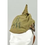 A WWI IMPERIAL GERMAN ARMY PICKELAUBE HELMET, complete with leather visor, strap, inner and metal