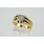 A 9CT GOLD GENTLEMAN'S DIAMOND RING, designed as a square panel set with nine single cut diamonds to