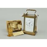A CARRIAGE CLOCK AND A MINIATURE TIMEPIECE, the Matthew Norman carriage clock with all glass