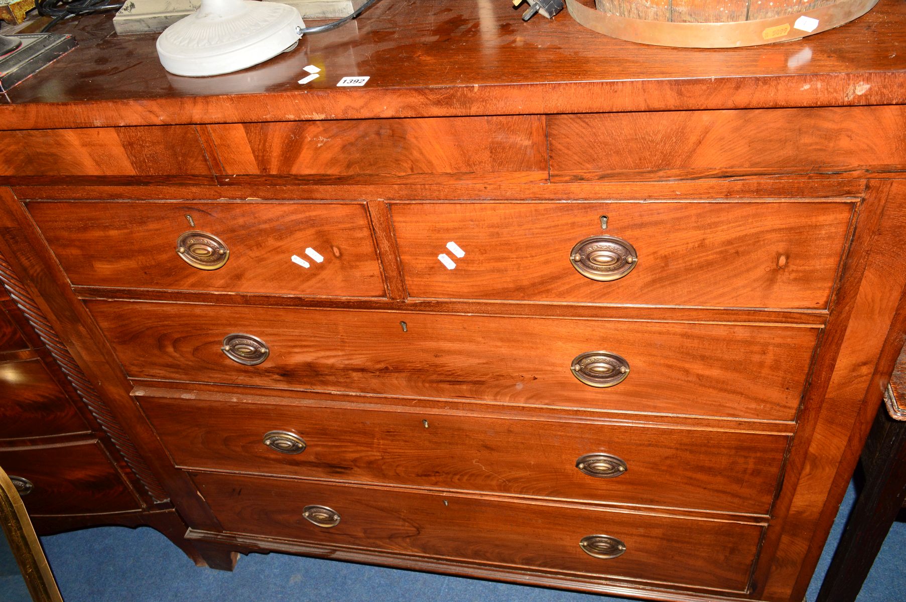 AN GEORGIAN OAK, MAHOGANY AND ROSEWOOD BANDED CHEST, of two short and three long graduated