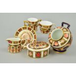 ROYAL CROWN DERBY IMARI MINIATURE ITEMS, '1128' pattern teacup and saucer, milk jug, cauldron (