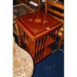 A REPRODUCTION YEWWOOD REVOLVING BOOKCASE