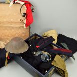 A LEATHER SPLIT TOP SUITCASE, containing a number of military items, to include Army Dress