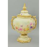 A GRAINGER & CO WORCESTER TWIN HANDLED URN AND COVER, of squat baluster form, blush ivory ground,