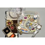 A SMALL SELECTION OF COSTUME JEWELLERY, to include two watches, a watch head, a pendant, a necklace,