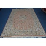 A LATE 20TH CENTURY AXMINSTER SILK RUG, peach and beige ground, approximately 277cm x 185cm (showing