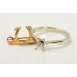 A PLATINUM RING MOUNT AND AN OMEGA PIN BROOCH, the platinum ring mount with four claws, with