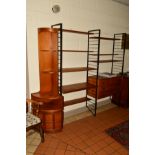 A LADDERAX TEAK TWO SECTION WALL SHELVING SYSTEM, comprising three metal laddered uprights, a