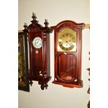 A REPRODUCTION MAHOGANY WALL CLOCK, together with an AMS wall clock (s.d.) (2)