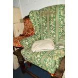AN UPHOLSTERED WING BACK ARMCHAIR on oak cabriole legs together with an Edwardian mahogany parlour
