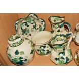 FIVE PIECES MASONS 'CHARTREUSE', to include two graduated jugs, heights 16cm and 14cm, a ginger jar,