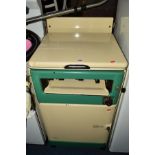 A VINTAGE ENAMELLED NEW WORLD GAS COOKER