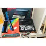 A SINCLAIR ZX81 VINTAGE PERSONAL COMPUTER, in its original box with a Memopak HRG, a Memopack 64K