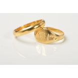 A WEDDING BAND AND A SIGNET RING, the wedding band plain D-shape, stamped 18kt, ring size J, the