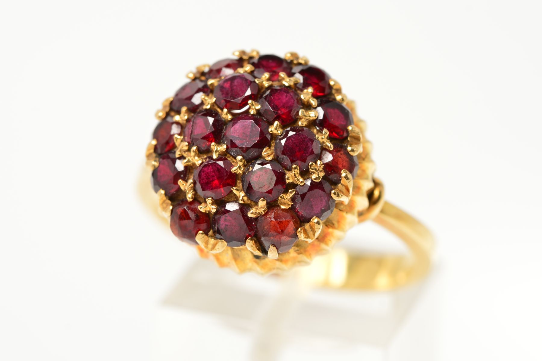 A GARNET AND RED PASTE DRESS RING, designed as circular garnets and red paste in a circular, - Image 3 of 3