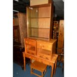 A MODERN PINE DRESSING TABLE with two drawers, together with a matching pair of bedside cabinets, an