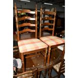 A SET OF SIX YOUNGER OAK DINING CHAIRS, including two carvers