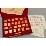 A LEATHER CASED SET OF LIMITED EDITION SILVER GILT REPLICAS OF STAMPS 'THE EMPIRE COLLECTION',