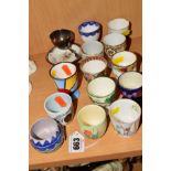 A SMALL COLLECTION OF EGG CUPS, to include Clarice Cliff 'Crocus', Poole Pottery, Shelley,