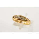 AN EDWARDIAN 18CT GOLD FIVE STONE DIAMOND RING, the navette shape panel pave set with five