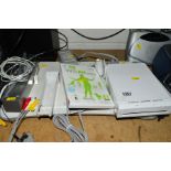A NINTENDO Wii with Wii fit board, controller and Wii fit game
