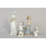 A LLADRO CAT, No.5113, designer Salvador Debon, height 13.5cm, a Nao figure, 'Country Girl with