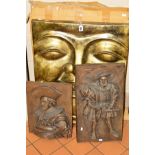 A BRONZED RESIN SMILING BUDDHA FACE WALL HANGING, approximately 80cm x 60cm, together with a