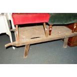 A LARGE DISTRESSED OAK DOUBLE HANDLED TRAY/TABLE